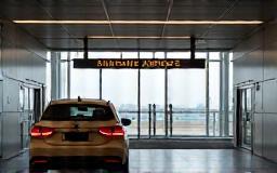 Car waiting at airport terminal